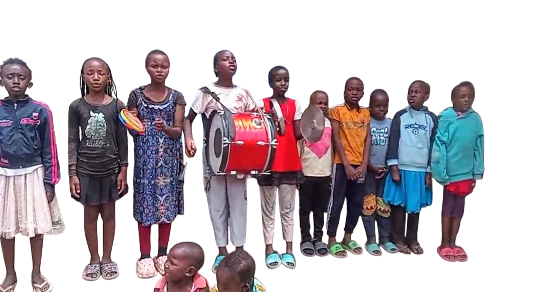 Children learning to play the drum set